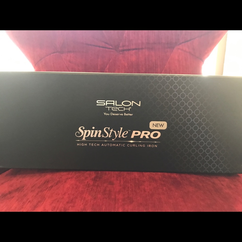 Automatic spinning curling iron